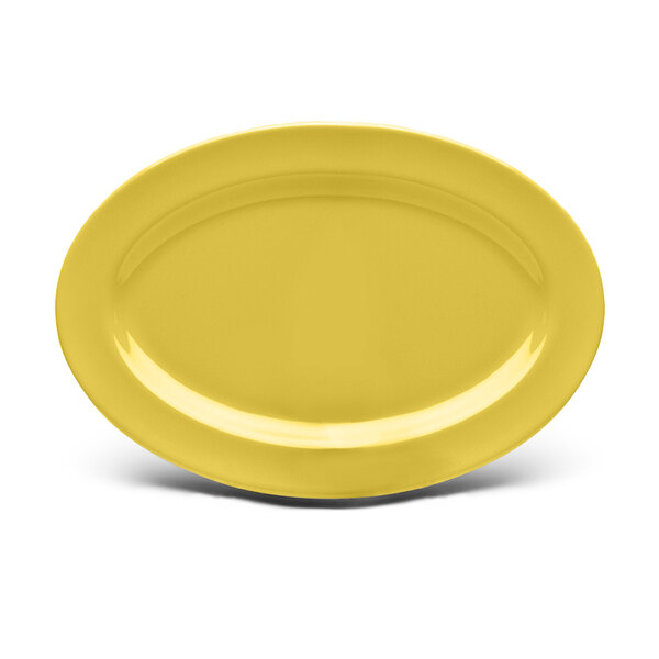 An Elite Global Solutions yellow oval melamine platter on a white background.