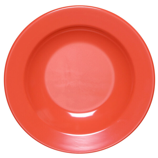 A red melamine bowl with a white background.