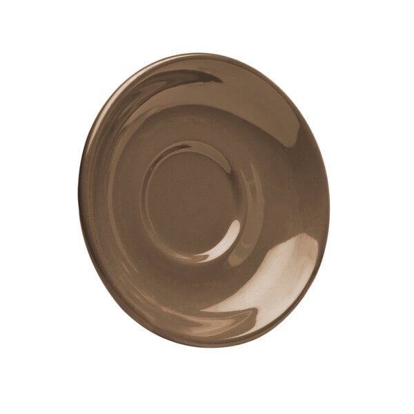 A brown Elite Global Solutions melamine saucer with a hole in the middle.
