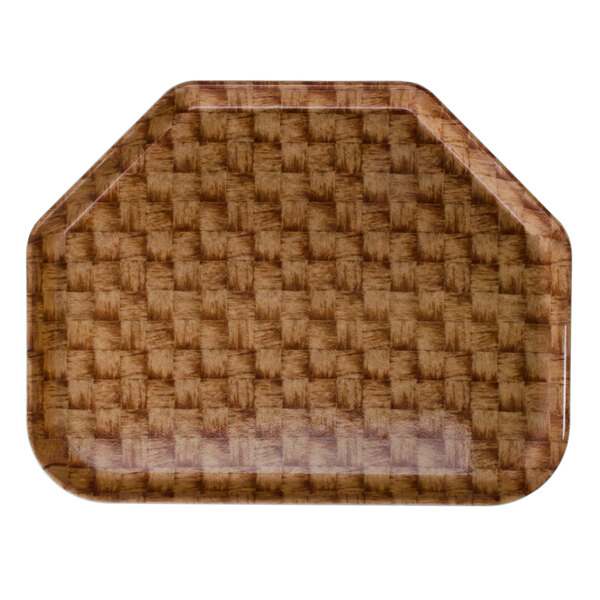 A brown Cambro tray with a basketweave pattern on a table in a deli.