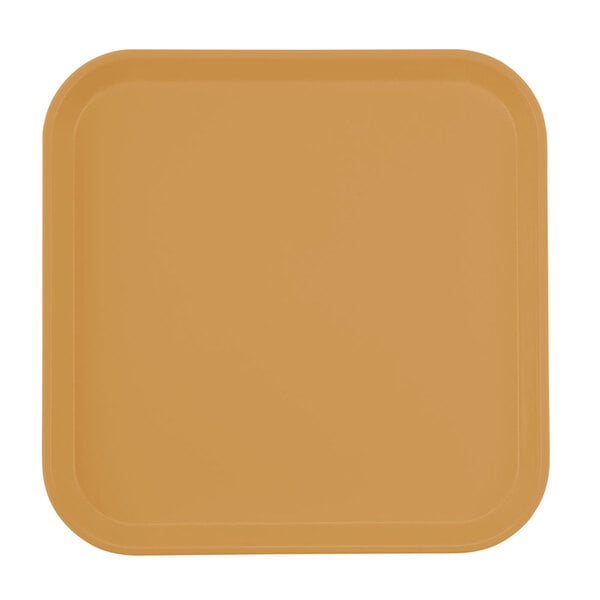 A square orange Cambro tray with a brown surface.