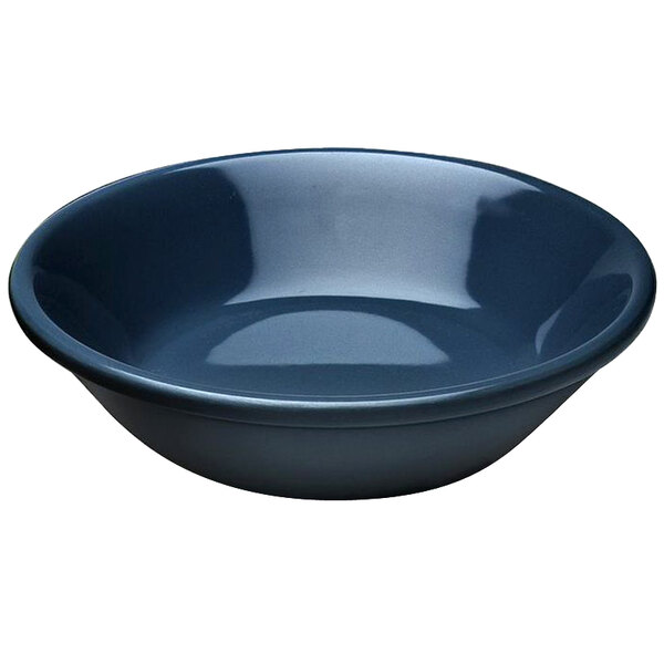 An Elite Global Solutions Lapis melamine monkey bowl with a dark blue rim.