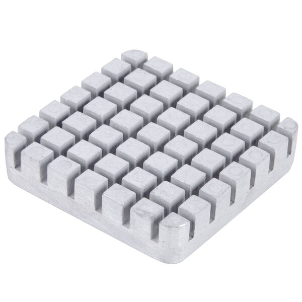 A white square push block with many squares.