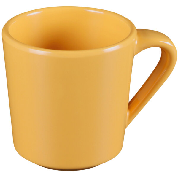 A close-up of a yellow Elite Global Solutions melamine mug with a handle.