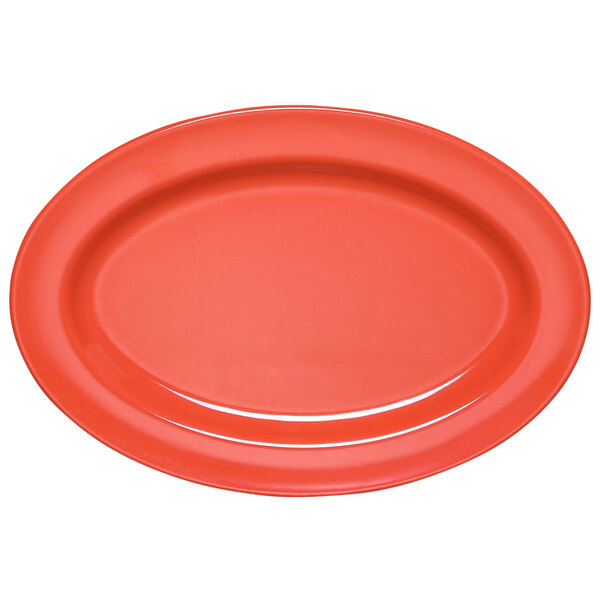 A red oval melamine platter with a coral rim.