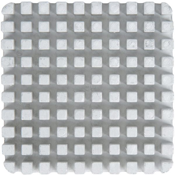 A white square push block with squares on it.
