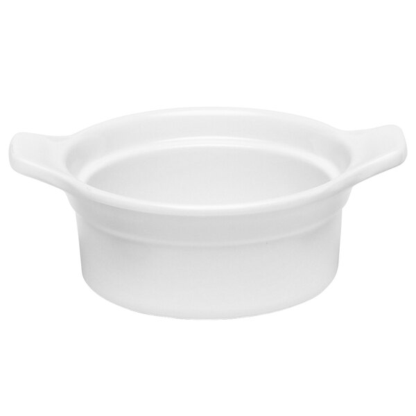 A white round casserole dish with two lug handles.