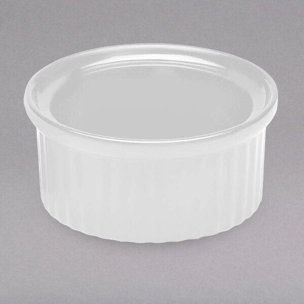 A white fluted round Elite Global Solutions melamine ramekin with a white background.