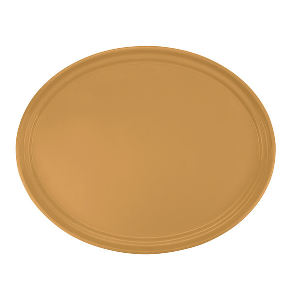 A close-up of a Cambro oval earthen gold fiberglass tray with a brown rim.