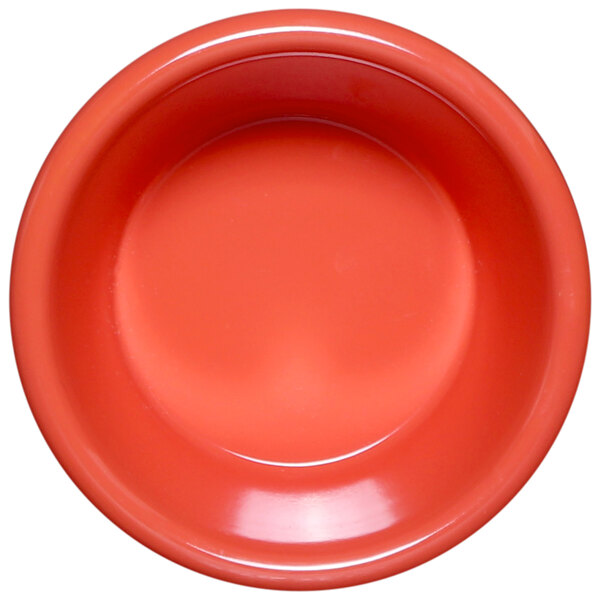 A white bowl with a red rim.