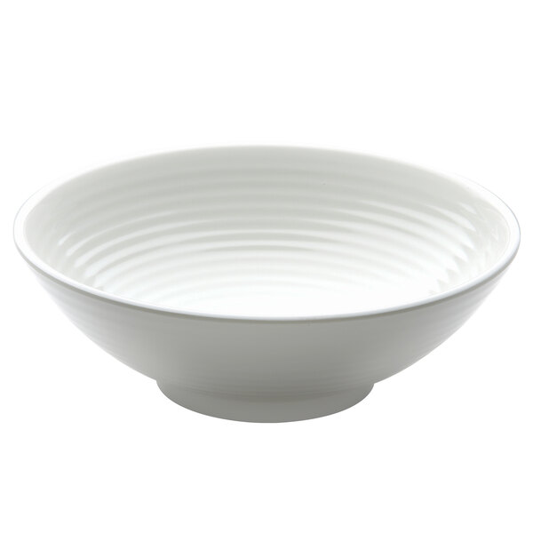 A white bowl with a wavy ring pattern.