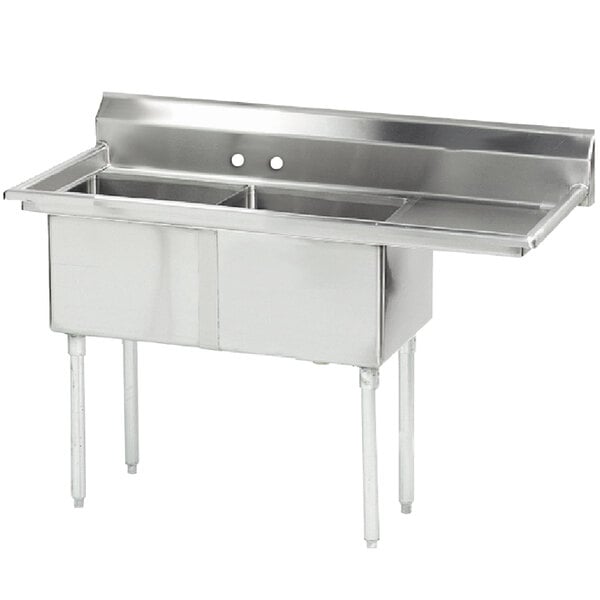 A stainless steel Advance Tabco 2-bowl sink with one drainboard on the right.