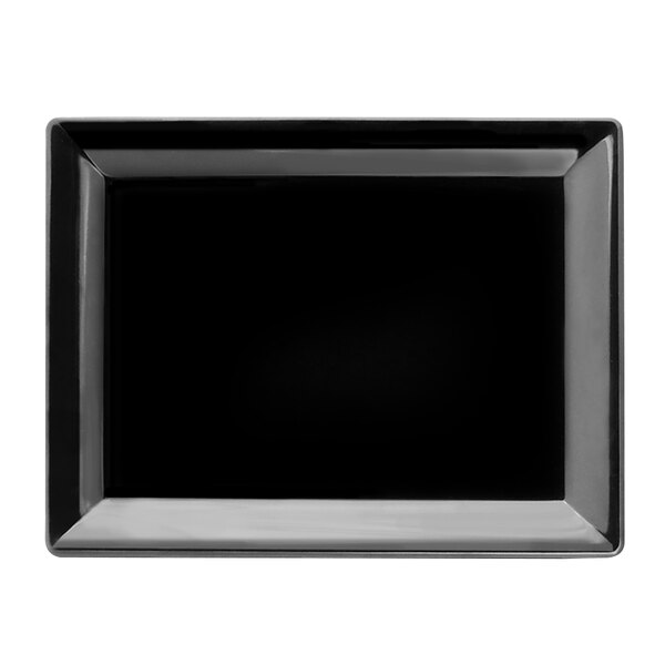 A black rectangular platter with a white border.