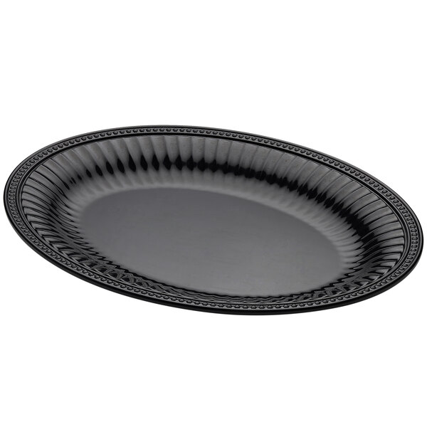 A black platter with a decorative edge.