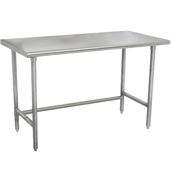 A rectangular stainless steel work table with legs.