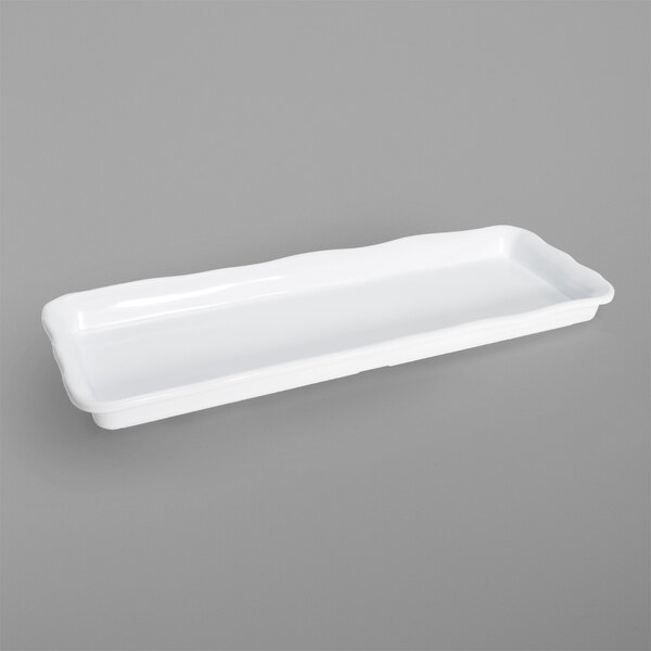 A white rectangular Elite Global Solutions melamine tray with organic edges on a gray background.