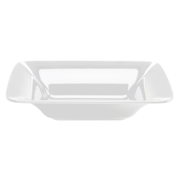 A white rectangular bowl with curved edges.
