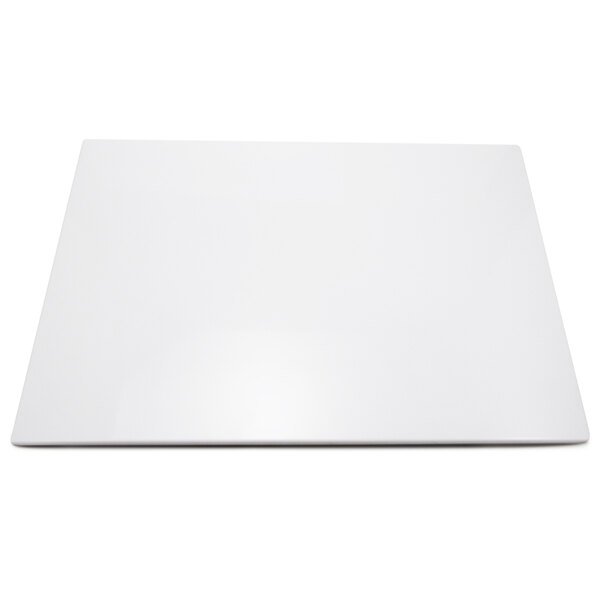 An Elite Global Solutions white melamine flat tray with feet on a white background.