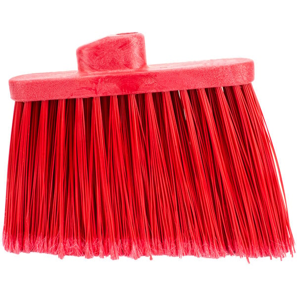 A red Carlisle broom head with long, red flagged bristles.