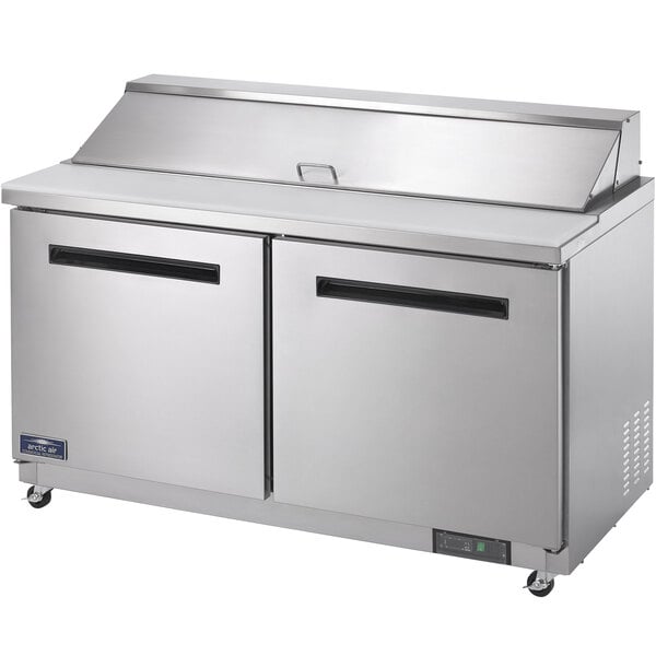 An Arctic Air stainless steel 2 door refrigerated sandwich prep table.
