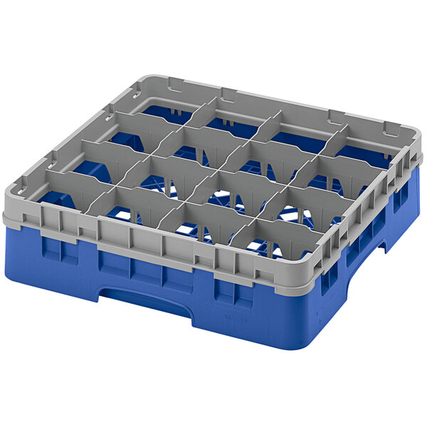 A blue and grey plastic Cambro glass rack with sixteen compartments.