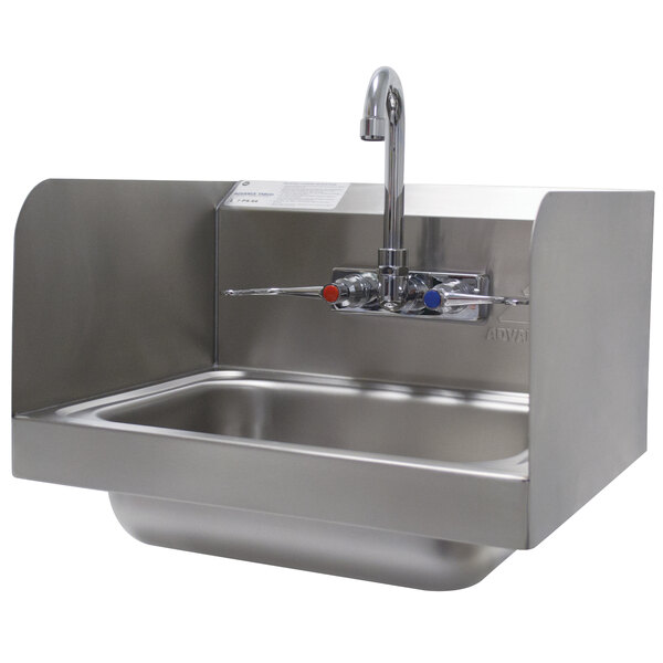A stainless steel Advance Tabco hand sink with faucet.
