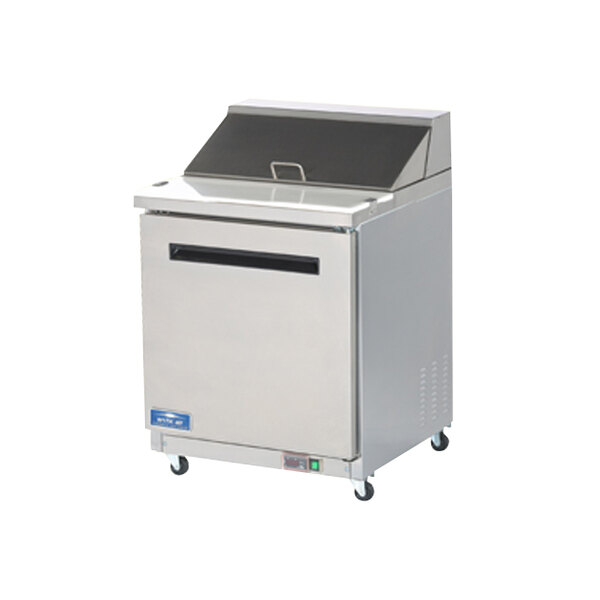 An Arctic Air stainless steel commercial sandwich prep table with a glass door.