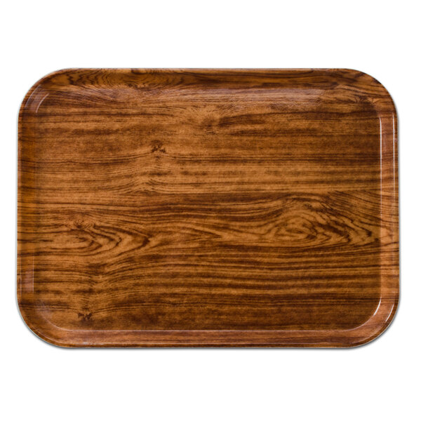 A rectangular Java teak Cambro tray with a dark wood finish.