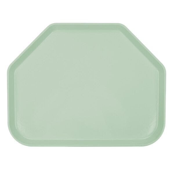 A green trapezoid-shaped Cambro tray.