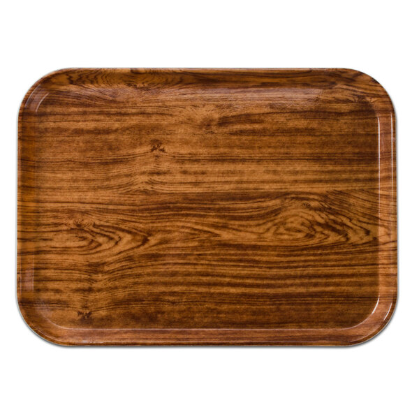 A rectangular Java teak wood tray with a wood grain.