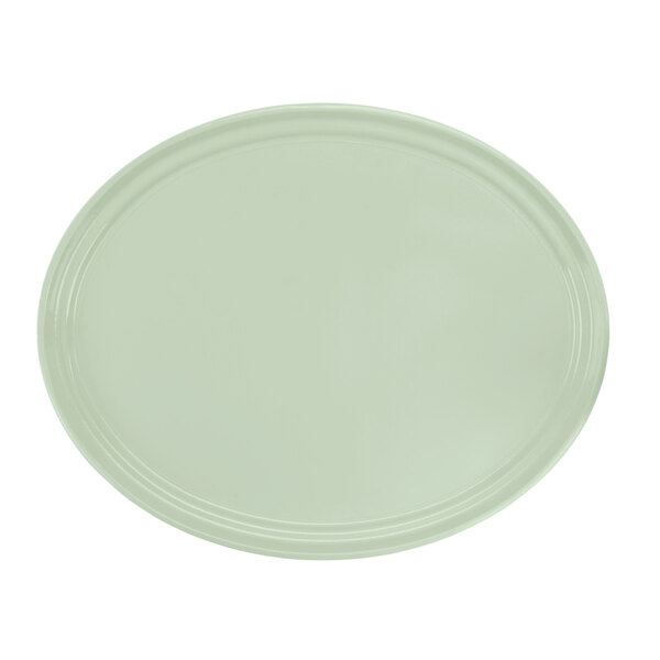 A green oval fiberglass tray with a white border.