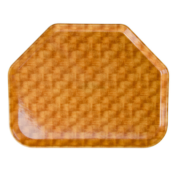 A brown trapezoid Cambro fiberglass tray with a light basketweave pattern.