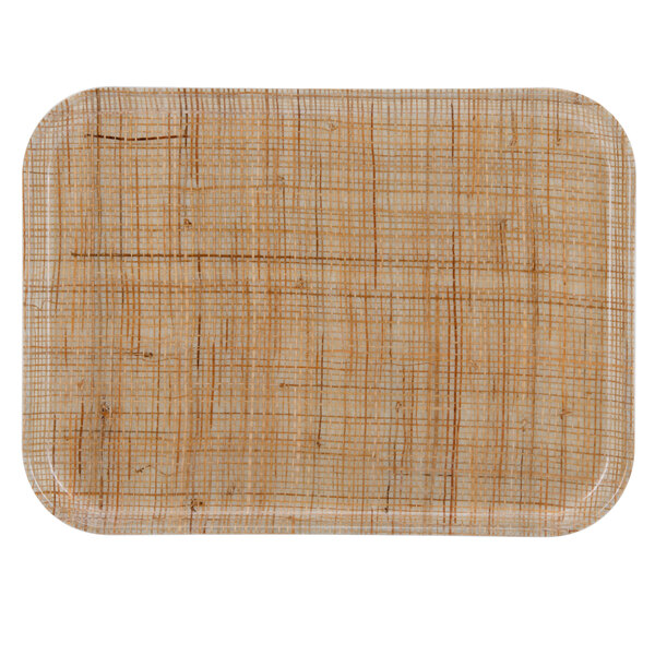 A rectangular Cambro tray with a woven rattan surface.