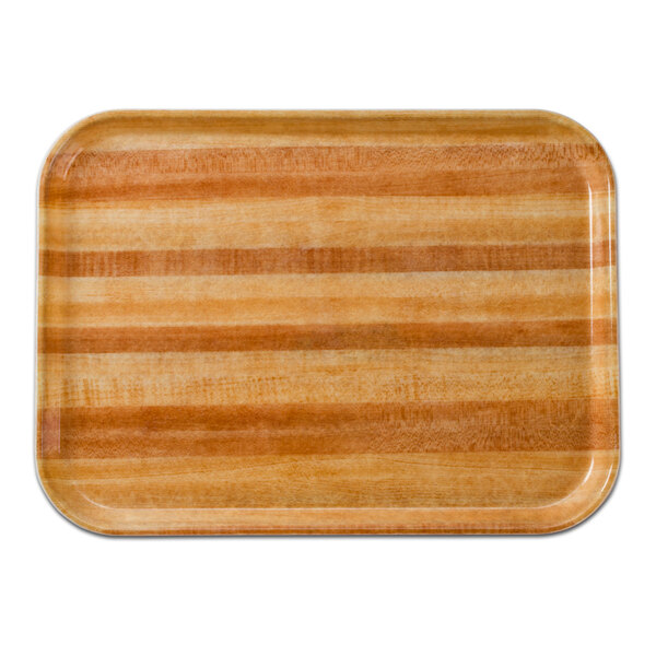 A rectangular light butcher block tray with stripes on it.