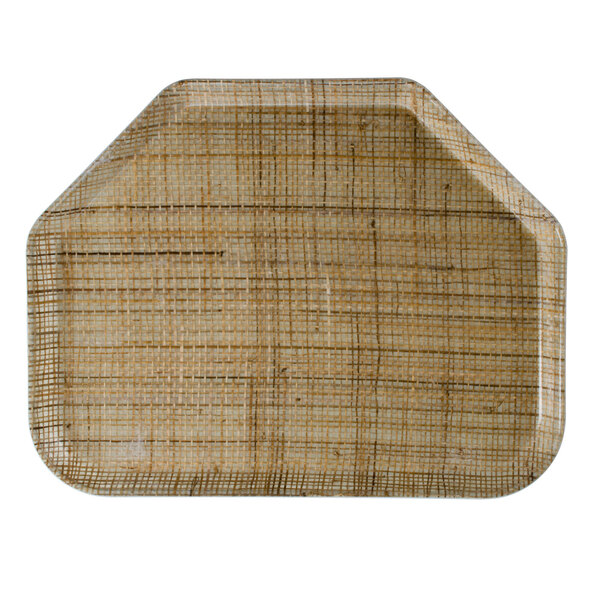 A Cambro trapezoid tray with a woven rattan pattern.