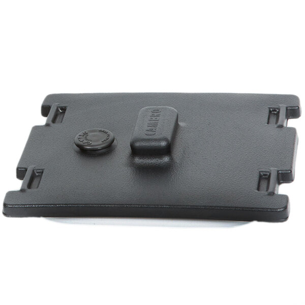 A black rectangular Cambro Camtainer lid with a button on it.