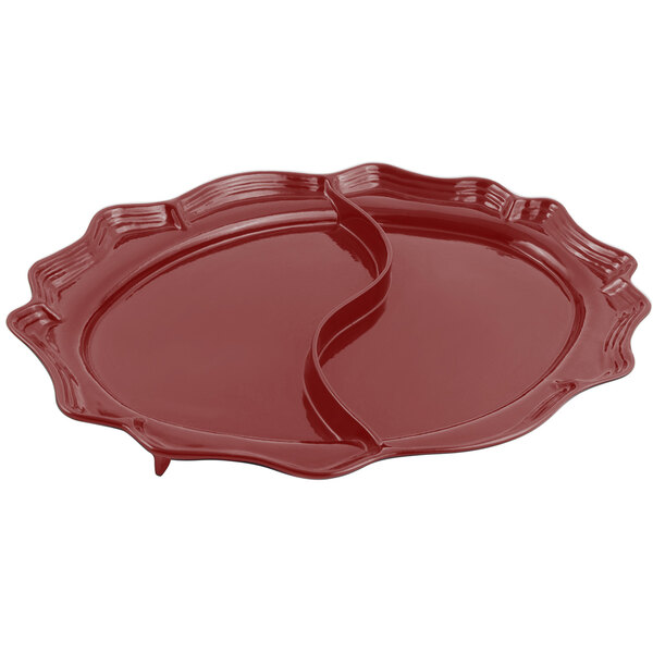 A Bon Chef divided oval platter in a terra cotta sandstone finish with two compartments.