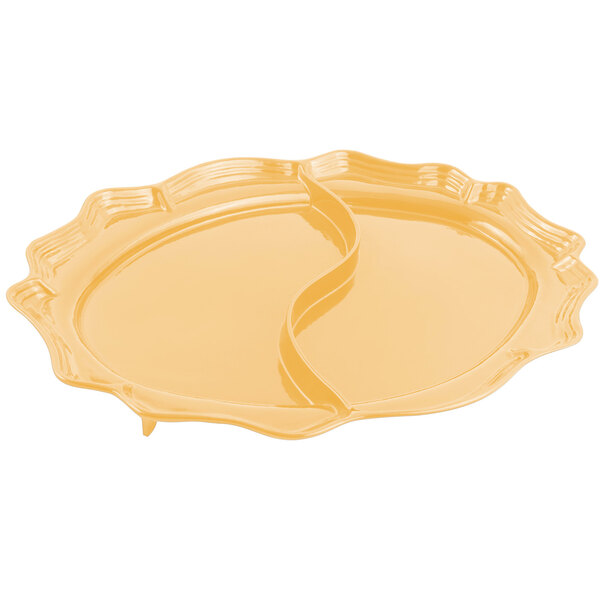 A yellow Bon Chef divided oval platter with a curved design and two handles.