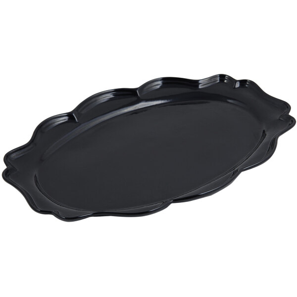 A black Bon Chef oval platter with a scalloped edge.