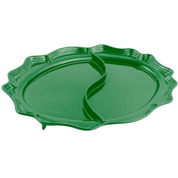 A green cast aluminum divided oval platter with a curved edge.