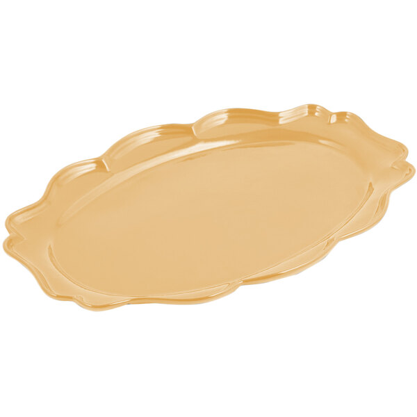 A Bon Chef cast aluminum oval platter with a ginger sandstone finish.