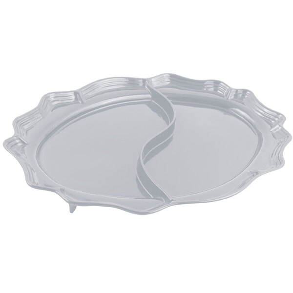 A pewter-glo divided oval platter with a curved design and two compartments.