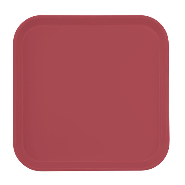 A red square Cambro tray with a white border.