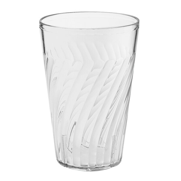 A clear plastic tumbler with a curved design.