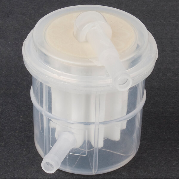 An ARY Vacmaster air filter with a plastic lid and nozzles.