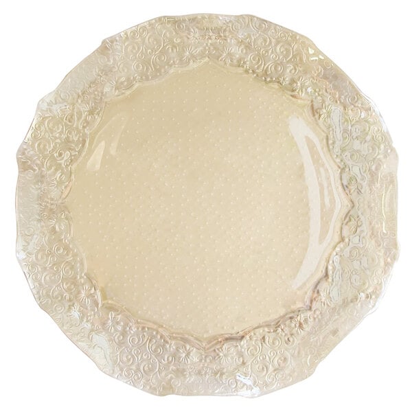 A white glass charger plate with an iris luster pearl design.