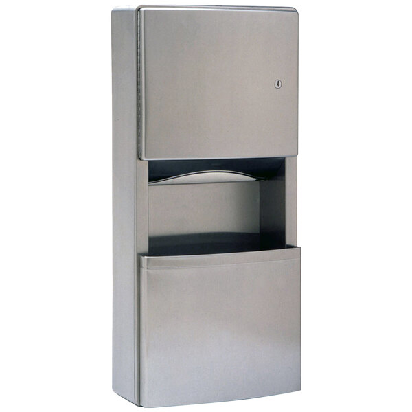 A silver metal Bobrick paper towel dispenser and waste receptacle with a door open.