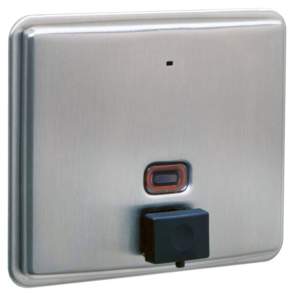 A silver stainless steel Bobrick wall-mounted soap dispenser.