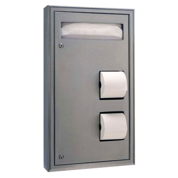 A silver metal Bobrick toilet seat cover and toilet tissue dispenser with two doors.