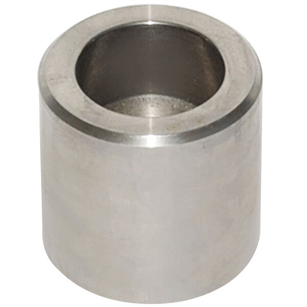 A silver metal cap with a hole on a metal cylinder.